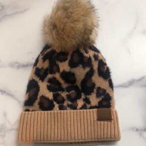 C.C Exclusives Soft Beanie Hat with Leopard Print Pattern and Faux Fur Pom